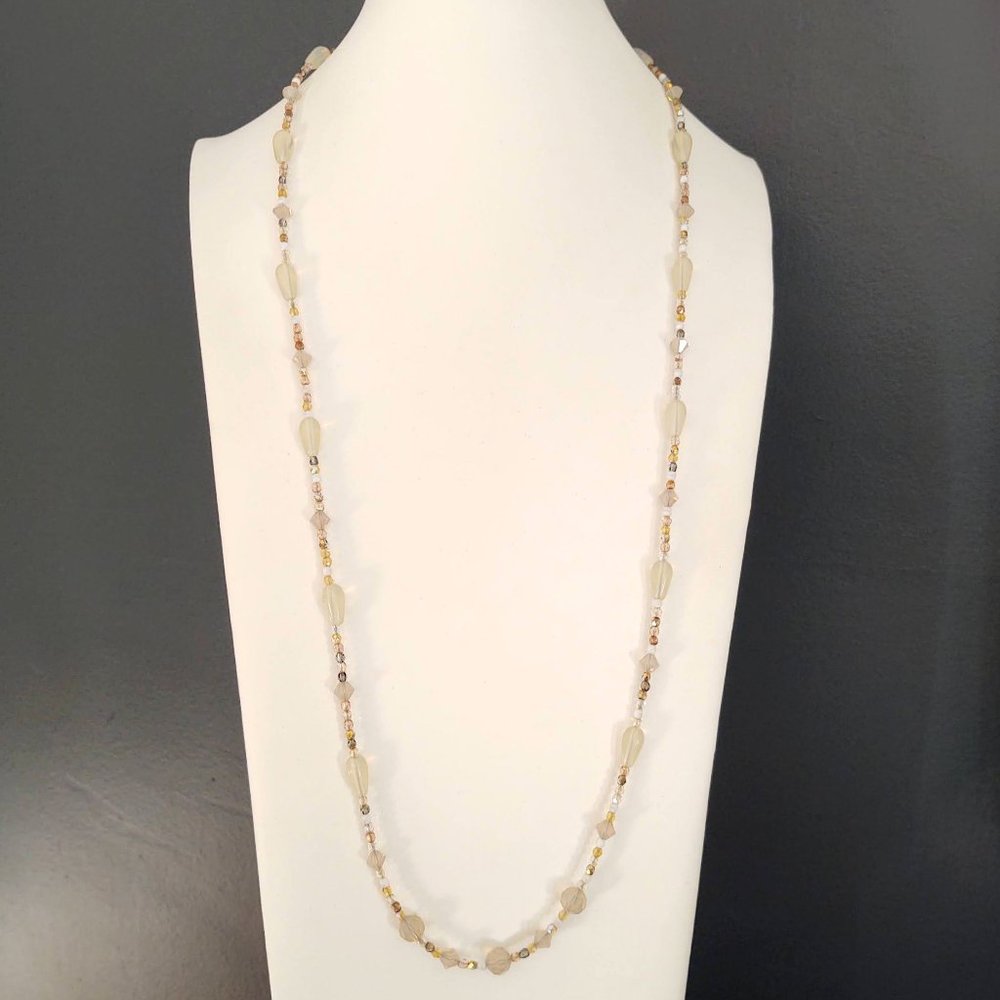 Clear, gray, brown and white beaded glass necklace